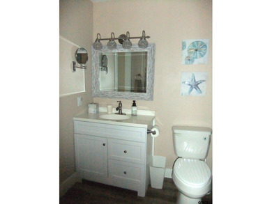 Totally and very tastefully remodeled this home is the on Holly Lake Ranch Golf Club in Texas - for sale on GolfHomes.com, golf home, golf lot