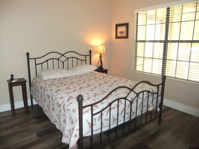 Totally and very tastefully remodeled this home is the on Holly Lake Ranch Golf Club in Texas - for sale on GolfHomes.com, golf home, golf lot