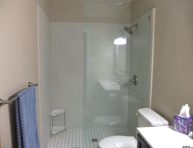 Totally and very tastefully remodeled this home is the on Holly Lake Ranch Golf Club in Texas - for sale on GolfHomes.com, golf home, golf lot
