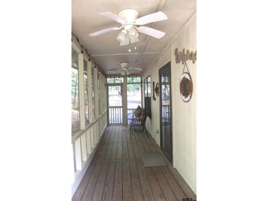 Totally and very tastefully remodeled this home is the on Holly Lake Ranch Golf Club in Texas - for sale on GolfHomes.com, golf home, golf lot