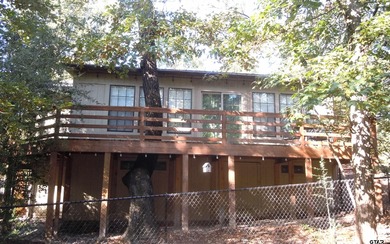 Totally and very tastefully remodeled this home is the on Holly Lake Ranch Golf Club in Texas - for sale on GolfHomes.com, golf home, golf lot