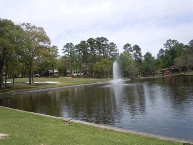 Totally and very tastefully remodeled this home is the on Holly Lake Ranch Golf Club in Texas - for sale on GolfHomes.com, golf home, golf lot
