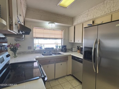 Experience Florida living with a tranquil setting in this on Daytona Beach Golf Club in Florida - for sale on GolfHomes.com, golf home, golf lot