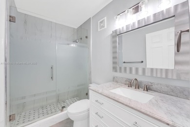 Welcome to this beautifully renovated 3-bed, 2.5-bath townhome on The Boca Country Club in Florida - for sale on GolfHomes.com, golf home, golf lot