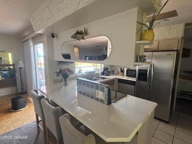 Experience Florida living with a tranquil setting in this on Daytona Beach Golf Club in Florida - for sale on GolfHomes.com, golf home, golf lot