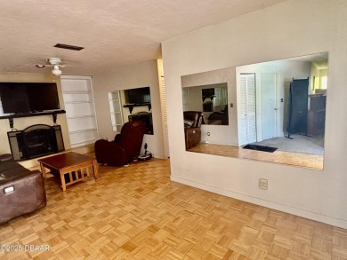 Experience Florida living with a tranquil setting in this on Daytona Beach Golf Club in Florida - for sale on GolfHomes.com, golf home, golf lot