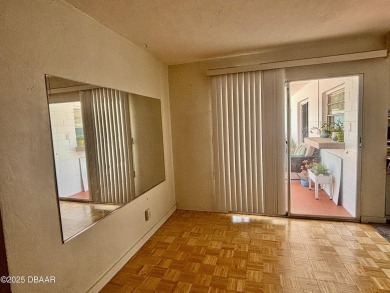 Experience Florida living with a tranquil setting in this on Daytona Beach Golf Club in Florida - for sale on GolfHomes.com, golf home, golf lot