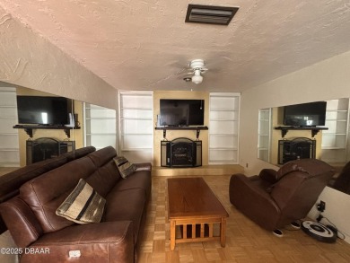 Experience Florida living with a tranquil setting in this on Daytona Beach Golf Club in Florida - for sale on GolfHomes.com, golf home, golf lot