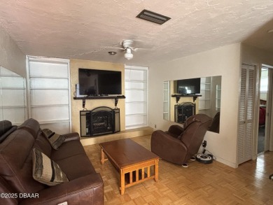 Experience Florida living with a tranquil setting in this on Daytona Beach Golf Club in Florida - for sale on GolfHomes.com, golf home, golf lot