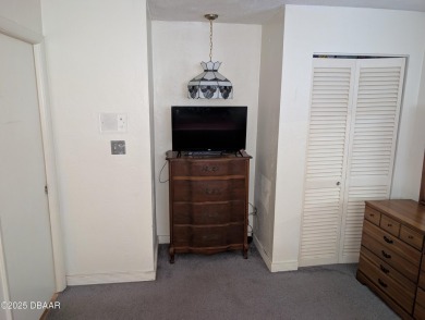 Experience Florida living with a tranquil setting in this on Daytona Beach Golf Club in Florida - for sale on GolfHomes.com, golf home, golf lot