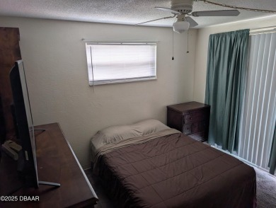 Experience Florida living with a tranquil setting in this on Daytona Beach Golf Club in Florida - for sale on GolfHomes.com, golf home, golf lot