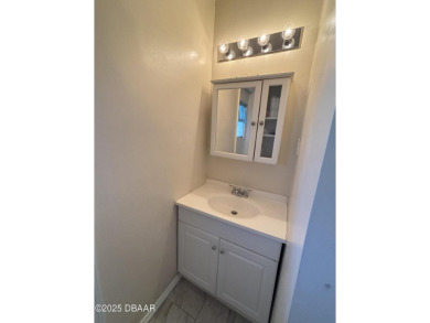 Experience Florida living with a tranquil setting in this on Daytona Beach Golf Club in Florida - for sale on GolfHomes.com, golf home, golf lot