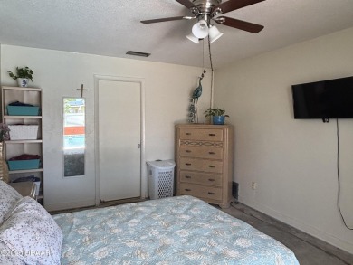Experience Florida living with a tranquil setting in this on Daytona Beach Golf Club in Florida - for sale on GolfHomes.com, golf home, golf lot