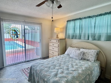 Experience Florida living with a tranquil setting in this on Daytona Beach Golf Club in Florida - for sale on GolfHomes.com, golf home, golf lot