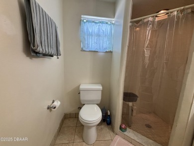 Experience Florida living with a tranquil setting in this on Daytona Beach Golf Club in Florida - for sale on GolfHomes.com, golf home, golf lot