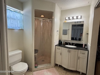 Experience Florida living with a tranquil setting in this on Daytona Beach Golf Club in Florida - for sale on GolfHomes.com, golf home, golf lot