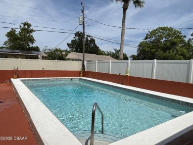 Experience Florida living with a tranquil setting in this on Daytona Beach Golf Club in Florida - for sale on GolfHomes.com, golf home, golf lot