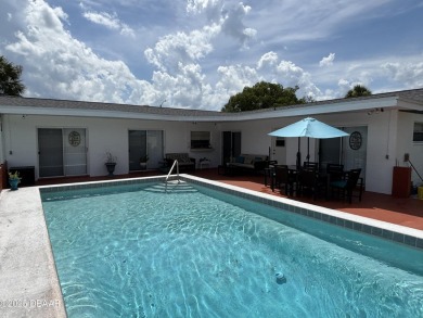 Experience Florida living with a tranquil setting in this on Daytona Beach Golf Club in Florida - for sale on GolfHomes.com, golf home, golf lot