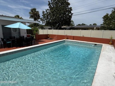 Experience Florida living with a tranquil setting in this on Daytona Beach Golf Club in Florida - for sale on GolfHomes.com, golf home, golf lot