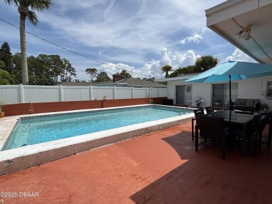 Experience Florida living with a tranquil setting in this on Daytona Beach Golf Club in Florida - for sale on GolfHomes.com, golf home, golf lot