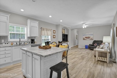 Truly a BOATER'S PARADISE -park your boat, jet-ski in your yard on Brick Landing Plantation Yacht and Golf Club in North Carolina - for sale on GolfHomes.com, golf home, golf lot