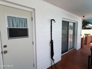 Experience Florida living with a tranquil setting in this on Daytona Beach Golf Club in Florida - for sale on GolfHomes.com, golf home, golf lot
