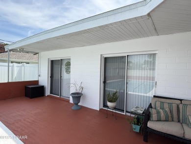 Experience Florida living with a tranquil setting in this on Daytona Beach Golf Club in Florida - for sale on GolfHomes.com, golf home, golf lot