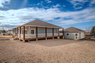 Welcome to your dream home, blending modern comfort with rustic on Canyon Breeze Golf Course in Utah - for sale on GolfHomes.com, golf home, golf lot