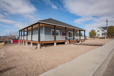 Welcome to your dream home, blending modern comfort with rustic on Canyon Breeze Golf Course in Utah - for sale on GolfHomes.com, golf home, golf lot