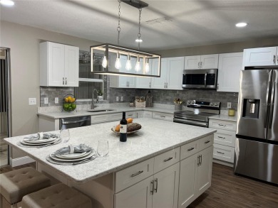 Beautiful Winthrop Model with 3 Bedrooms, 2 full baths and 2-Car on On Top of the World Golf Course in Florida - for sale on GolfHomes.com, golf home, golf lot