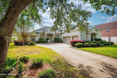 Discover luxury living in the prestigious, guard-gated Country on Country Club of Orange Park in Florida - for sale on GolfHomes.com, golf home, golf lot