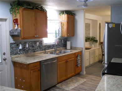 Beautiful Turnkey home located in Orange Blossom Gardens. Just on Silver Lake Executive Golf Course in Florida - for sale on GolfHomes.com, golf home, golf lot