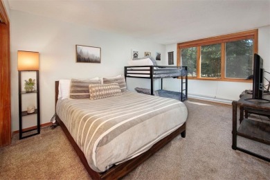 Absolutely gorgeous vistas of the Ten Mile Range from this 2 bed on The River Course At Keystone in Colorado - for sale on GolfHomes.com, golf home, golf lot