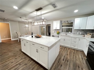 Beautiful Winthrop Model with 3 Bedrooms, 2 full baths and 2-Car on On Top of the World Golf Course in Florida - for sale on GolfHomes.com, golf home, golf lot