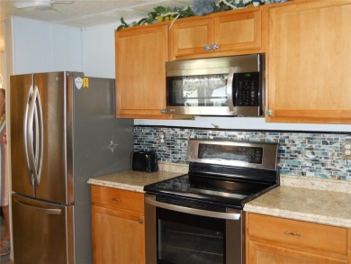 Beautiful Turnkey home located in Orange Blossom Gardens. Just on Silver Lake Executive Golf Course in Florida - for sale on GolfHomes.com, golf home, golf lot