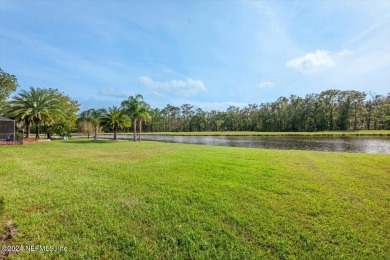 Discover luxury living in the prestigious, guard-gated Country on Country Club of Orange Park in Florida - for sale on GolfHomes.com, golf home, golf lot