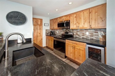 Absolutely gorgeous vistas of the Ten Mile Range from this 2 bed on The River Course At Keystone in Colorado - for sale on GolfHomes.com, golf home, golf lot