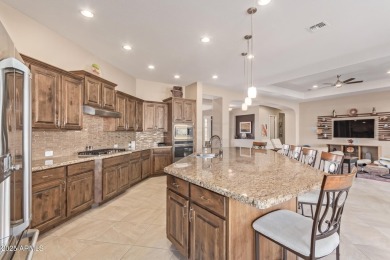 Showcasing a perfect blend of sophistication  comfort, David on Estrella Mountain Ranch Golf Course in Arizona - for sale on GolfHomes.com, golf home, golf lot