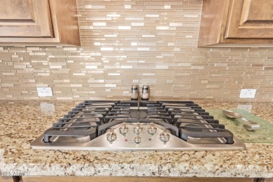 Showcasing a perfect blend of sophistication  comfort, David on Estrella Mountain Ranch Golf Course in Arizona - for sale on GolfHomes.com, golf home, golf lot