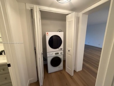 Newly renovated unit is a must see featuring a beautiful view of on Atlantis Golf Club in Florida - for sale on GolfHomes.com, golf home, golf lot