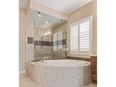 Showcasing a perfect blend of sophistication  comfort, David on Estrella Mountain Ranch Golf Course in Arizona - for sale on GolfHomes.com, golf home, golf lot