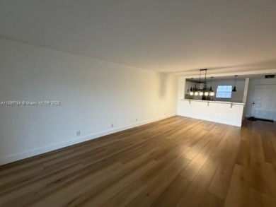 Newly renovated unit is a must see featuring a beautiful view of on Atlantis Golf Club in Florida - for sale on GolfHomes.com, golf home, golf lot