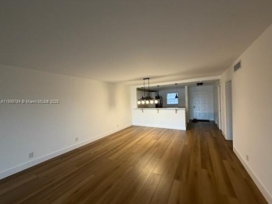Newly renovated unit is a must see featuring a beautiful view of on Atlantis Golf Club in Florida - for sale on GolfHomes.com, golf home, golf lot