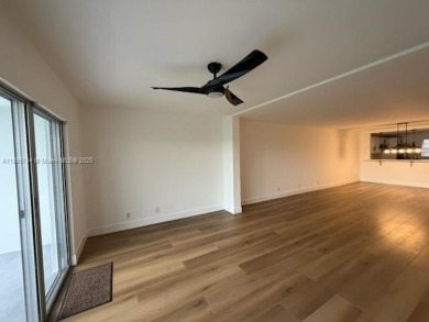 Newly renovated unit is a must see featuring a beautiful view of on Atlantis Golf Club in Florida - for sale on GolfHomes.com, golf home, golf lot