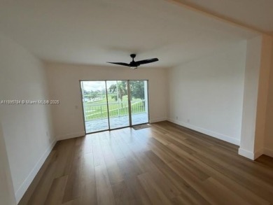 Newly renovated unit is a must see featuring a beautiful view of on Atlantis Golf Club in Florida - for sale on GolfHomes.com, golf home, golf lot