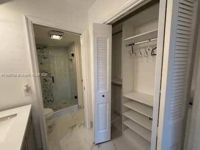 Newly renovated unit is a must see featuring a beautiful view of on Atlantis Golf Club in Florida - for sale on GolfHomes.com, golf home, golf lot