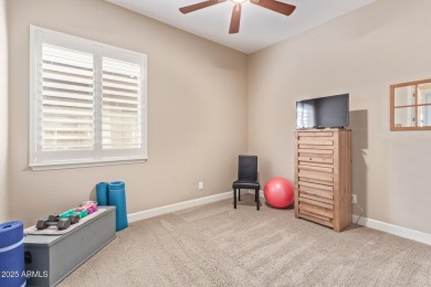 Showcasing a perfect blend of sophistication  comfort, David on Estrella Mountain Ranch Golf Course in Arizona - for sale on GolfHomes.com, golf home, golf lot