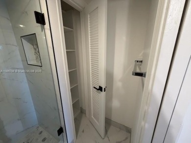 Newly renovated unit is a must see featuring a beautiful view of on Atlantis Golf Club in Florida - for sale on GolfHomes.com, golf home, golf lot