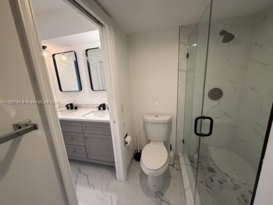 Newly renovated unit is a must see featuring a beautiful view of on Atlantis Golf Club in Florida - for sale on GolfHomes.com, golf home, golf lot