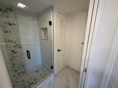 Newly renovated unit is a must see featuring a beautiful view of on Atlantis Golf Club in Florida - for sale on GolfHomes.com, golf home, golf lot